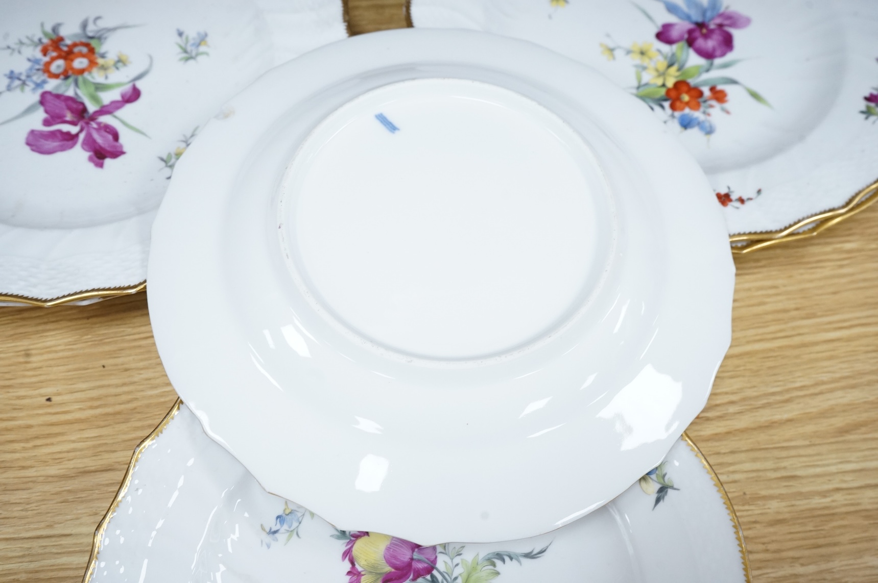 Ten 19th century Copenhagen floral porcelain plates, 23cm in diameter